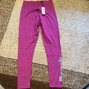 NWT Bench pink legging with Bench written down the one leg.
